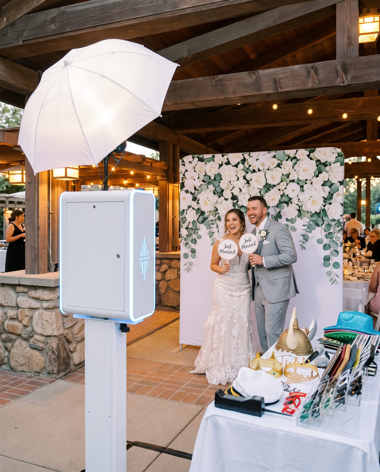 Bride and groom holding Just Married signs